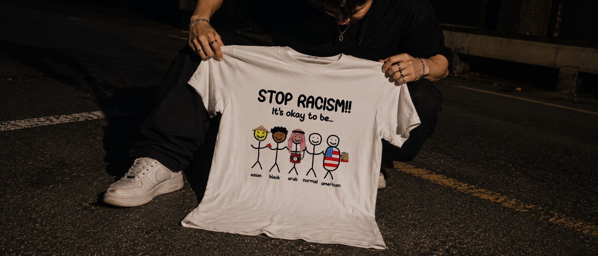 SVAGGY graphic T-shirt photographed at night